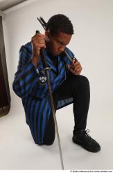 Garson KNEELING POSE WITH SHOTGUN